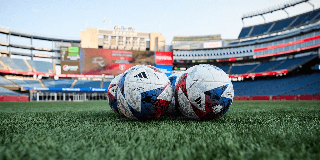 Soccer balls on Gillette Stadium field